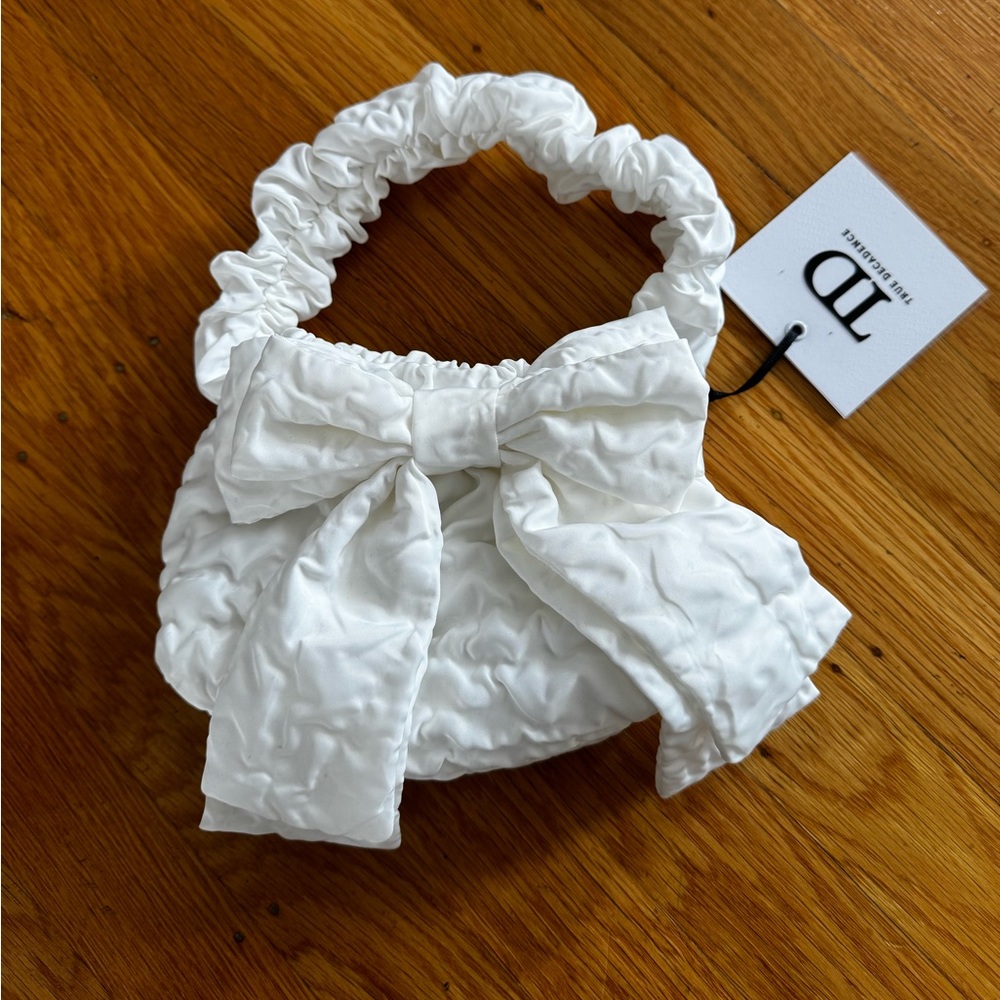 Brand new white textured bag